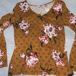 Daytrip long sleeve open back top!